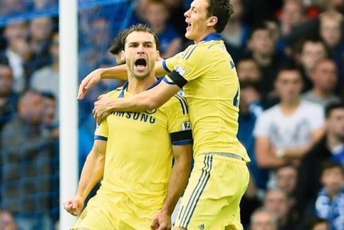 Chelsea's Branislav Ivanovic (L) celebrates with teammate Nemanja Matic after scoring a goal against Everton during their English Premier League soccer match at Goodison Park in Liverpool, northern England, August 30, 2014.