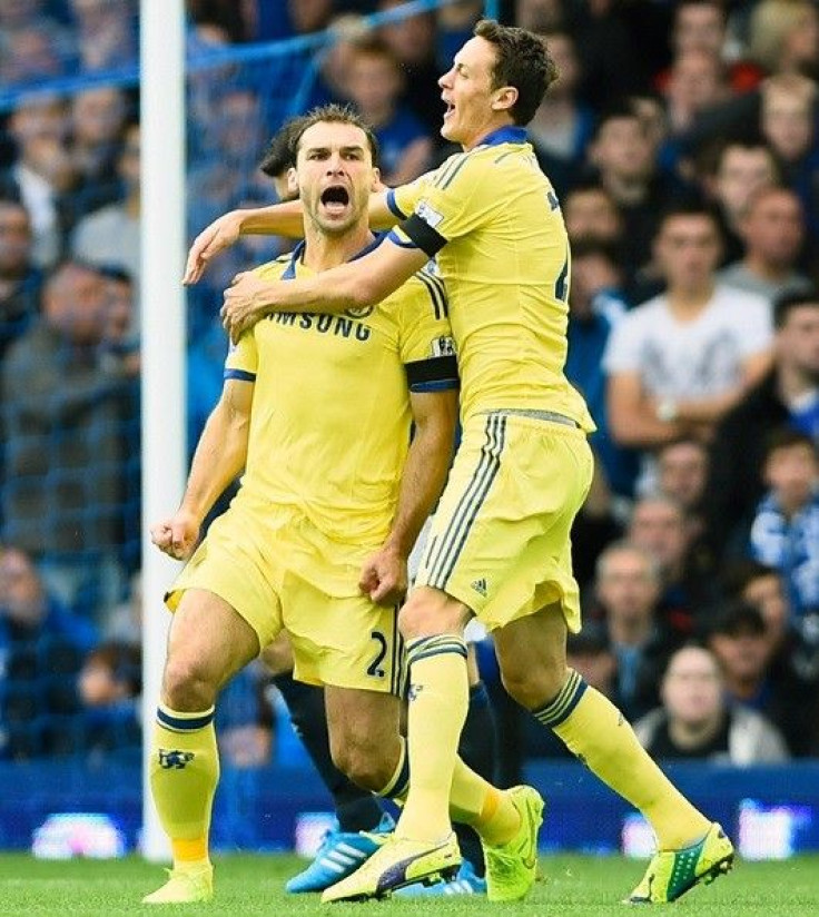 Chelsea's Branislav Ivanovic (L) celebrates with teammate Nemanja Matic after scoring a goal against Everton during their English Premier League soccer match at Goodison Park in Liverpool, northern England, August 30, 2014.