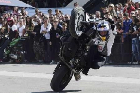 German motorbike stunt rider Chris Pfeiffer performs at the Macedonian capital of Skopje