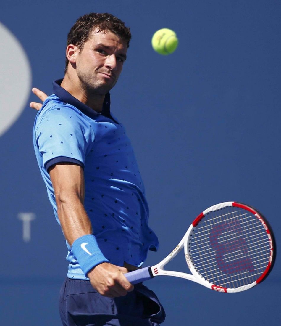 Grigor Dimitrov of Bulgaria hits a return to Dudi Sela of Israel during their match at the 2014 U.S. Open tennis tournament in New York, August 29, 2014. REUTERSAdam Hunger