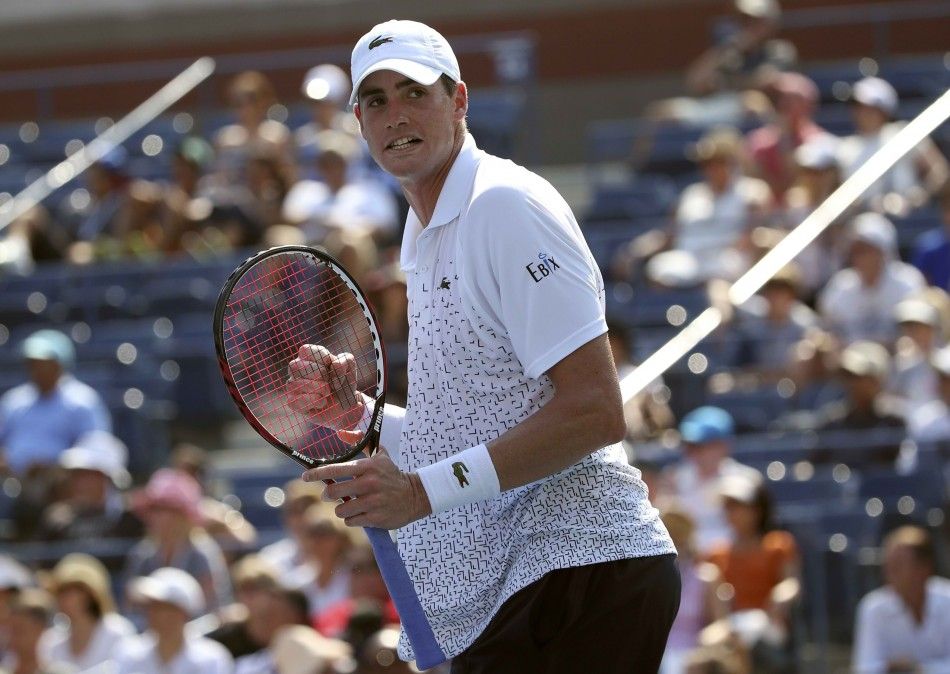 John Isner of the U.S. celebrates his win over compatriot Marcos Giron during their match at the 2014 U.S. Open tennis tournament in New York, August 26, 2014. REUTERSAdam Hunger