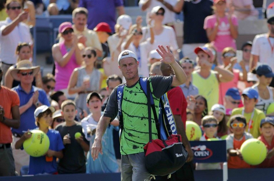 Lleyton Hewitt of Australia waves after being defeated by Tomas Berdych of the Czech Republic in their match at the 2014 U.S. Open tennis tournament in New York, August 27, 2014. REUTERSEduardo Munoz
