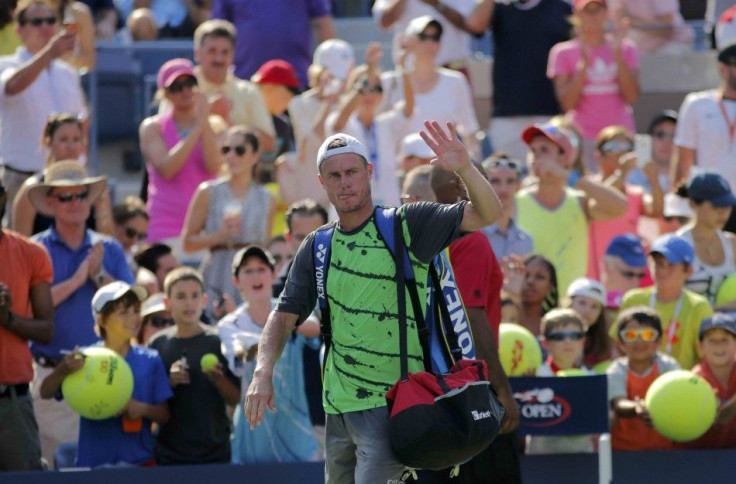 Lleyton Hewitt of Australia waves after being defeated by Tomas Berdych of the Czech Republic in their match at the 2014 U.S. Open tennis tournament in New York, August 27, 2014. REUTERS/Eduardo Munoz