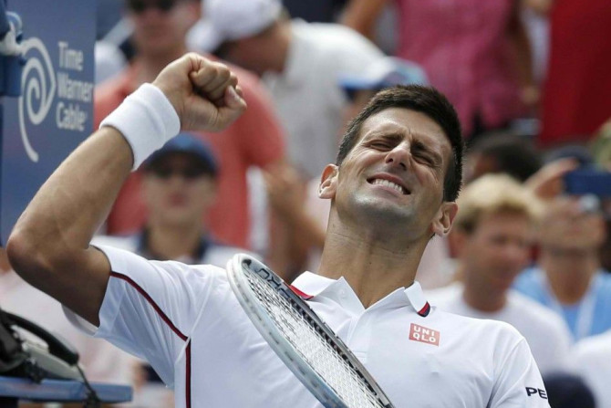 Novak Djokovic of Serbia reacts after defeating Sam Querrey of the U.S. at the 2014 U.S. Open tennis tournament in New York, August 30, 2014. REUTERS/Ray Stubblebine