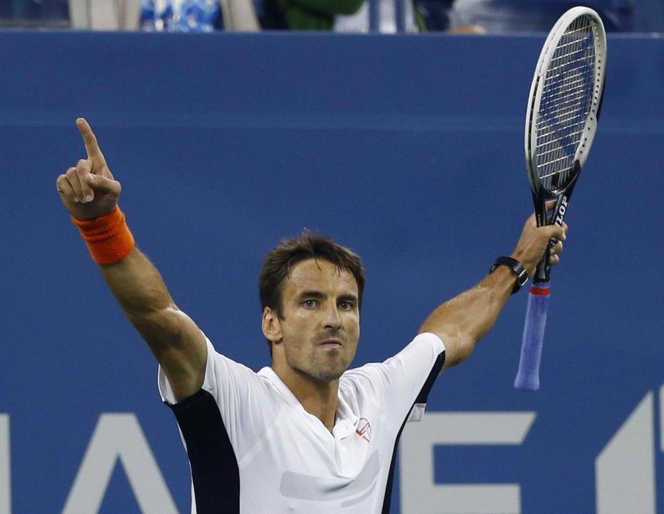 Tommy Robredo of Spain celebrates after defeating Nick Kyrgios of Australia during their mens singles match at the 2014 U.S. Open tennis tournament in New York, August 31, 2014. REUTERSAdam Hunger