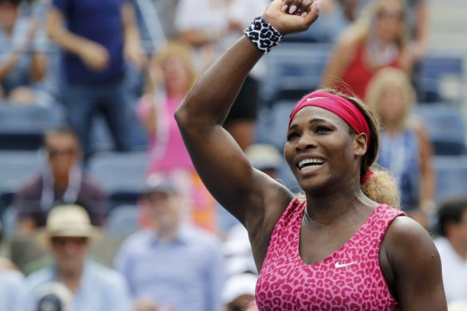 Serena Williams of the U.S. reacts after defeating Kaia Kanepi of Estonia at the 2014 U.S. Open tennis tournament in New York, September 1, 2014.