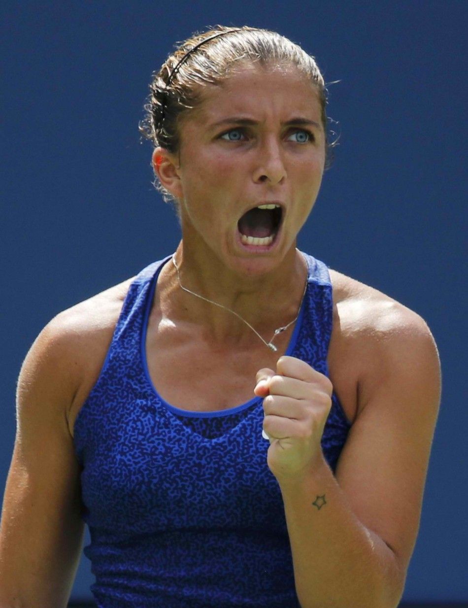 Sara Errani of Italy celebrates a point against Mirjana Lucic-Baroni of Croatia during their match at the 2014 U.S. Open tennis tournament in New York, August 31, 2014. REUTERSRay Stubblebine