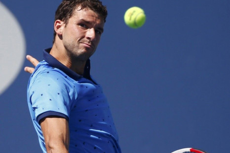 Grigor Dimitrov of Bulgaria hits