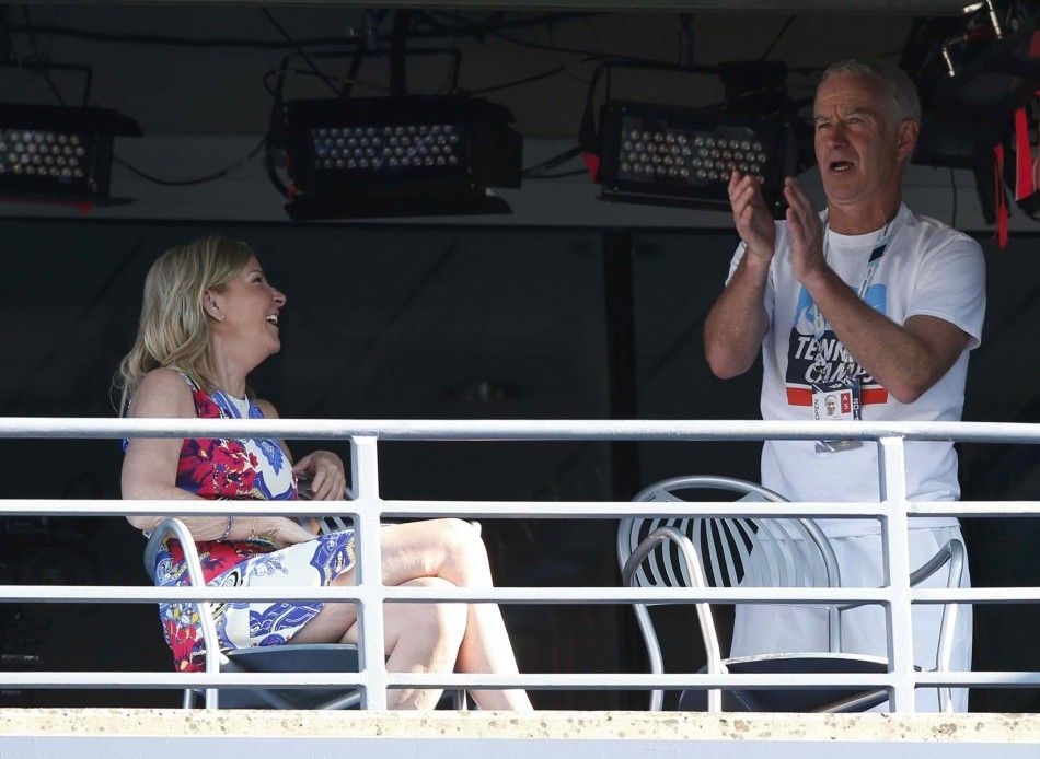 Tennis greats Chris Evert and John McEnroe R talk in a television booth during at the 2014 U.S. Open tennis tournament in New York, August 25, 2014. REUTERSMike Segar