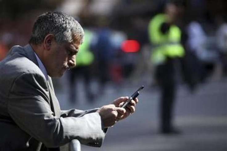 A man uses a smartphone