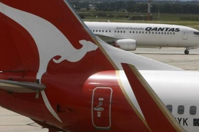 Two Qantas passenger jets are seen on the tarmac at Melbourne&#039;s Tullamarine Airport