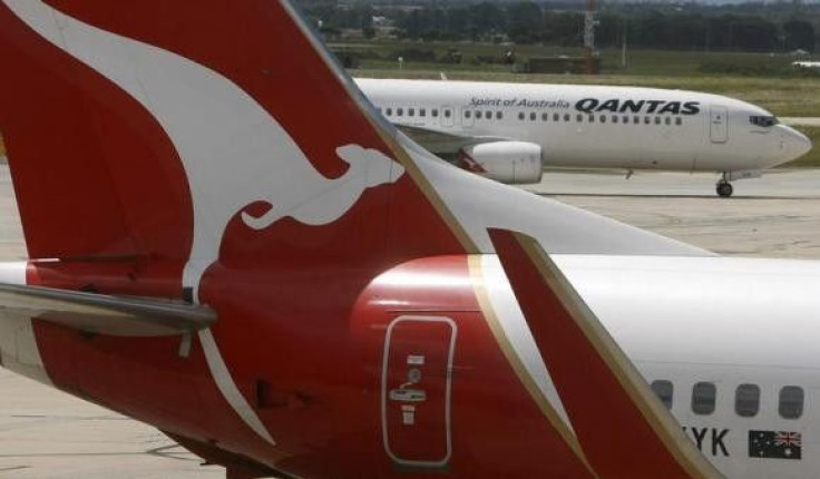 Two Qantas passenger jets are seen on the tarmac at Melbourne&#039;s Tullamarine Airport
