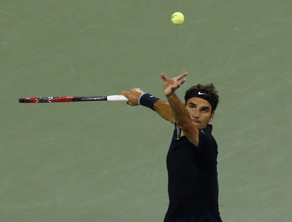 Roger Federer of Switzerland serves 