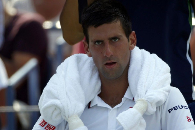 Novak Djokovic of Serbia cools off 