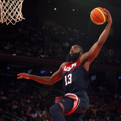 Aug 22, 2014; New York, NY, USA; United States guard James Harden (13) dunks against Puerto Rico during the fourth quarter of a game at Madison Square Garden.