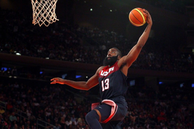 Aug 22, 2014; New York, NY, USA; United States guard James Harden (13) dunks against Puerto Rico during the fourth quarter of a game at Madison Square Garden.