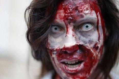 A woman, dressed as a zombie, takes part in a flashmob in Vienna