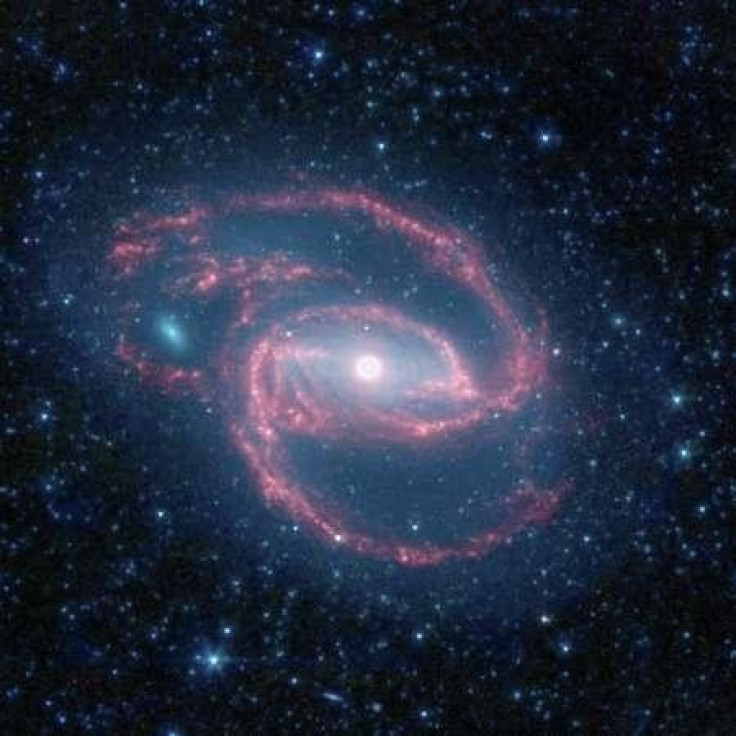 NASA's Spitzer Space Telescope has imaged a coiled galaxy with an eye-like object at its center