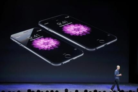 Apple CEO Tim Cook speaks during an Apple event announcing the iPhone 6 and the iPhone 6 Plus at the Flint Center in Cupertino, California, September 9, 2014.