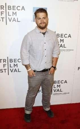 Jack Osbourne poses as he arrives for a screening of quotThe Bang Bang Clubquot 