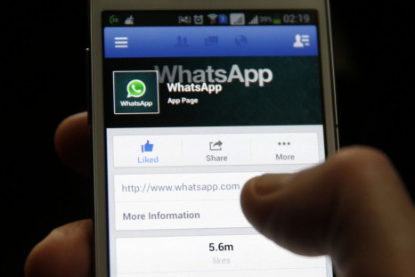 A Whatsapp App page is seen on Facebook on a Samsung Galaxy S4 phone