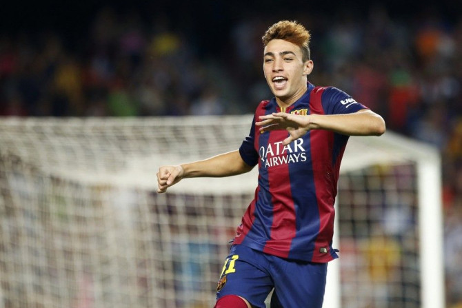Barcelona's Munir El Haddadi celebrates his goal during the Spanish first division soccer match against Elche at Nou Camp stadium in Barcelona August 24, 2014.