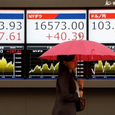 Japan tech shares slip; others relieved at U.S. jobs