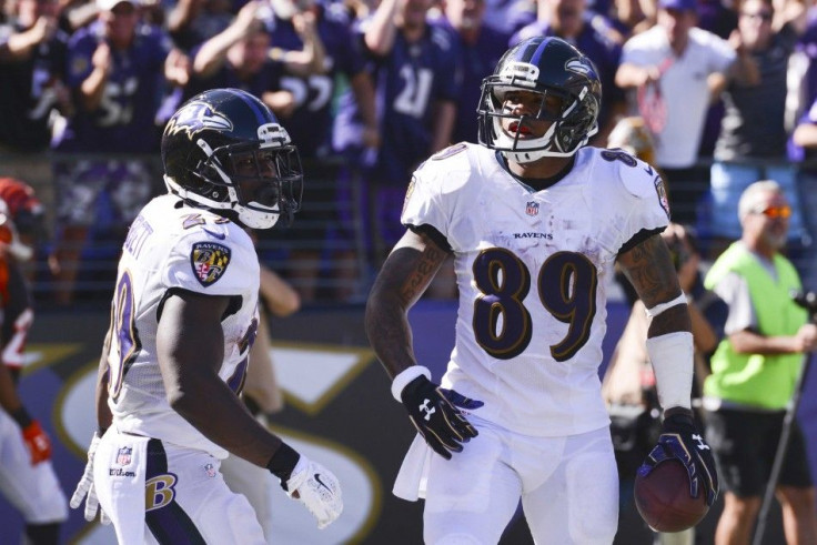 Baltimore Ravens wide receiver Steve Smith (89) celebrates with running back Justin Forsett (29)