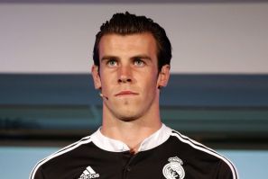 Real Madrid&#039;s Gareth Bale poses during the launching ceremony of the team&#039;s new UEFA Champions League kit at Santiago Bernabeu stadium in Madrid August 26, 2014. Real Madrid&#039;s players will wear this kit, designed by Japanese artist Yohji Ya
