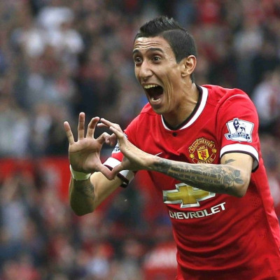 Manchester United&#039;s Angel Di Maria celebrates after scoring a goal against Queens Park Rangers during their English Premier League soccer match at Old Trafford in Manchester, northern England September 14, 2014.