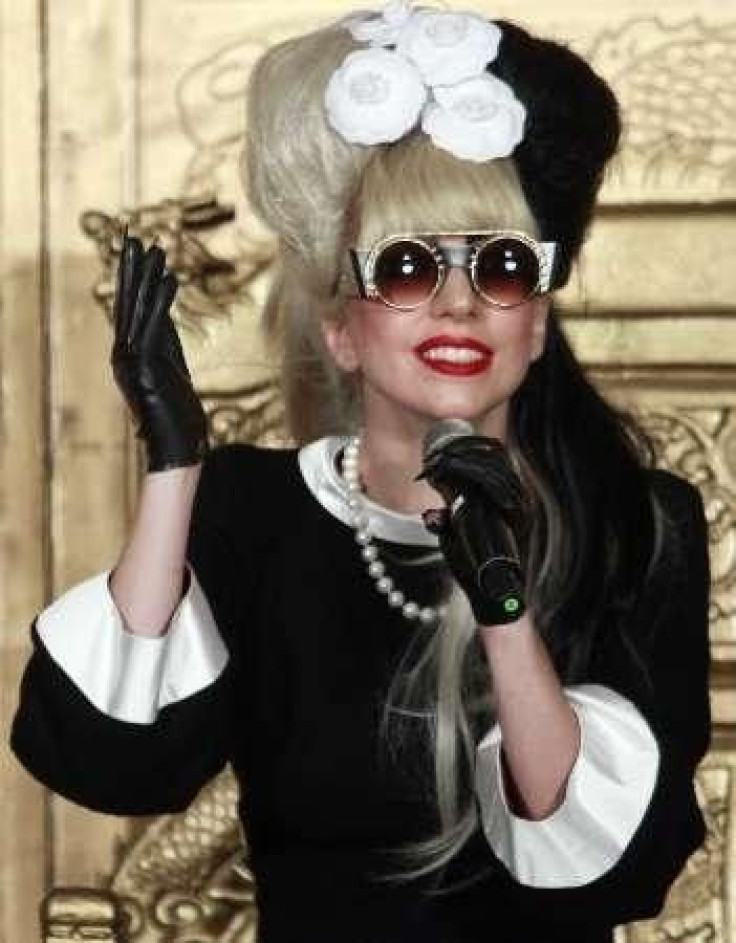 U.S. singer Lady Gaga speaks during a news conference in Taipei