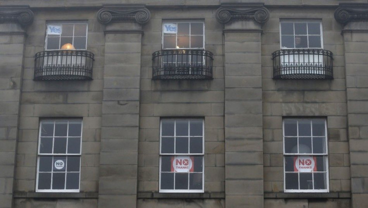 Opposing yes and no signs are seen in Edinburgh, Scotland, September 15, 2014. The referendum on Scottish independence will take place on September 18, when Scotland will vote whether or not to end the 307-year-old union with the rest of the United Kingdo