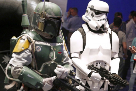 People Dressed As 'Star Wars' Characters Boba Fett, Left, And A Stormtrooper.