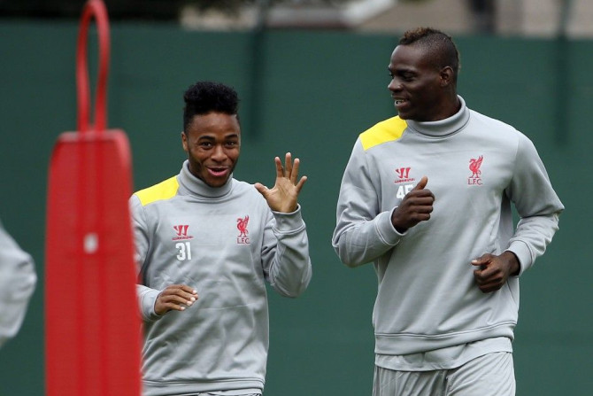 Liverpool&#039;s Raheem Sterling (L) talks with Mario Balotelli during a training session at the club&#039;s Melwood training complex in Liverpool, northern England September 15, 2014. Liverpool are set to play Bulgarian side Ludogorets Razgrad in the Cha