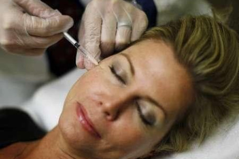 Recently unemployed Larisa Erwin gets free Botox injections from Dr. Shannan Ginnan at Reveal in Arlington