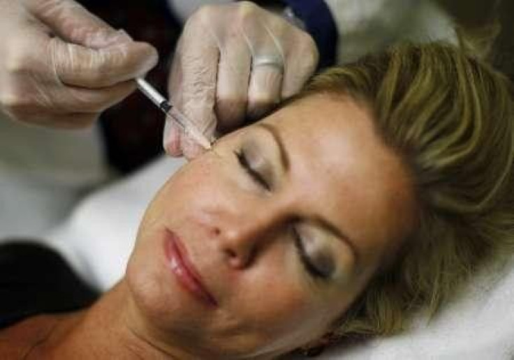 Recently unemployed Larisa Erwin gets free Botox injections from Dr. Shannan Ginnan at Reveal in Arlington