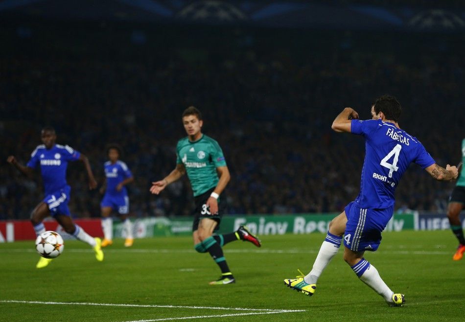 Chelseas Cesc Fabregas R scores a goal against Schalke 04 during their Champions League soccer match against at Stamford Bridge in London September 17, 2014. 