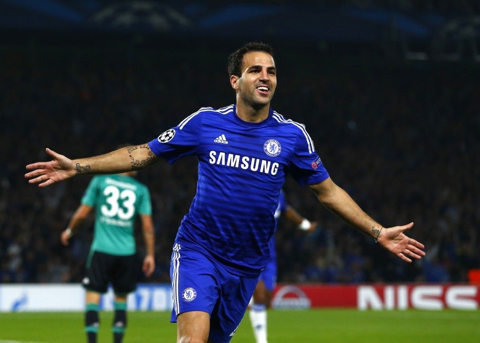 Chelseas Cesc Fabregas celebrates after scoring a goal against Schalke 04 during their Champions League soccer match against at Stamford Bridge in London September 17, 2014. 