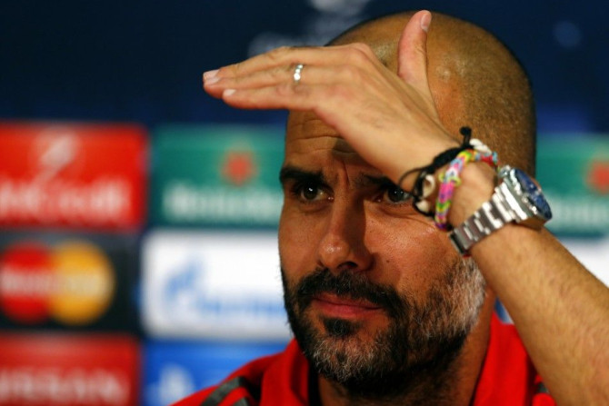 Bayern Munich's coach Pep Guardiola addresses a news conference before their Champions League group E soccer match against Manchester City, in Munich September 16, 2014.