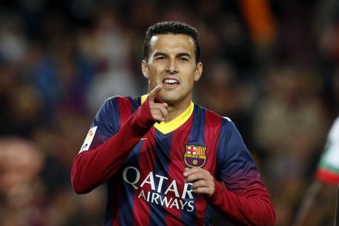 Barcelona's soccer player Pedro Rodriguez celebrates a goal against Granada during their Spanish first division league match at Camp Nou stadium in Barcelona November 23, 2013.