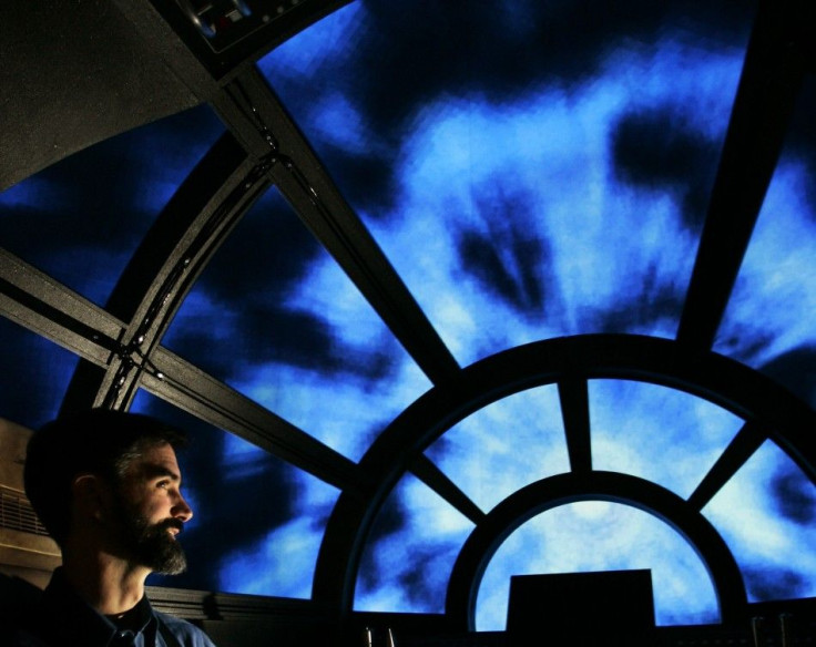 IN PHOTO: Content developer Ed Rodley sits in a full size replica of the cockpit of the Millennium Falcon from Star Wars: Episode IV