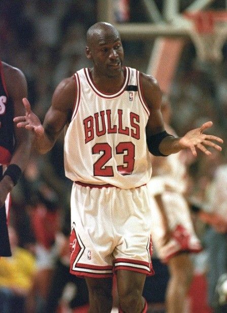 Chicago Bulls Michael Jordan shrugs after sinking a basket to set a new points record for scoring in one half of an NBA finals game during first half play against Portland in Chicago June 3, 1992. Jordan scored 35 points in the first half leading Chicago 