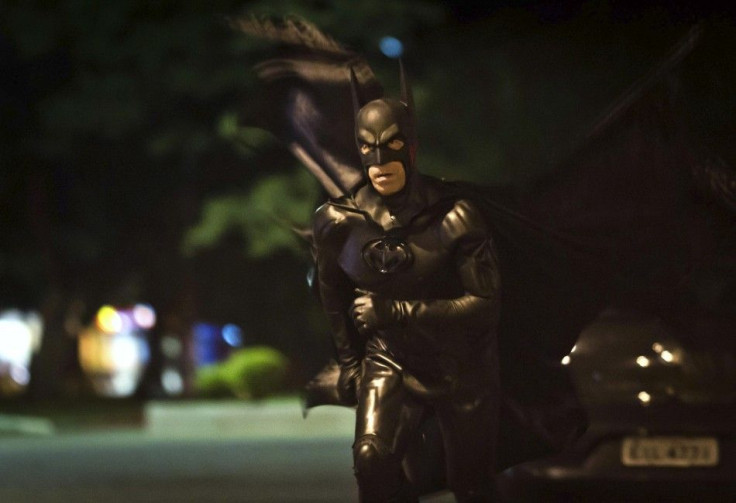 Retired Brazilian police officer Andre Luiz Pinheiro, 50, dressed as super-hero Batman