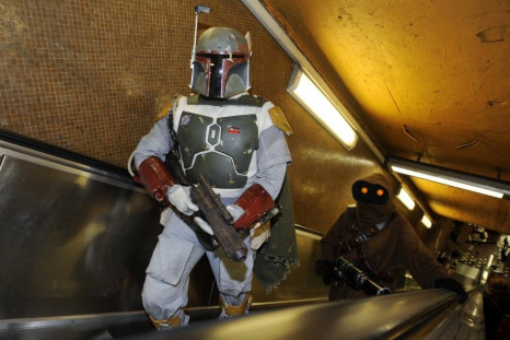 Participants Wearing Star Wars Costumes Make Their Way Through The De Brouckere Metro Station