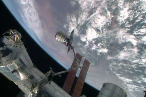 The International Space Station&#039;s robotic arm, Canadarm2, grapples the Orbital Sciences&#039; Cygnus cargo craft, as seen in this still image taken from NASA TV July 16, 2014. The Orbital Sciences Corp cargo ship reached the International Space Stati