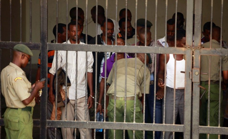 Suspected Somali pirates captured by the Dutch navy working under NATO command are seen behind bars at the Mombasa Law Courts in the Kenyan coastal city of Mombasa, January 23, 2014.