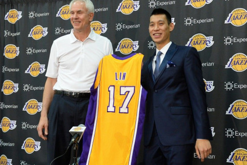Jul 24, 2014; El Segundo, CA, USA; Los Angeles Lakers general manager Mitch Kupchak introduces Jeremy Lin during a press conference at Toyota Sports Center