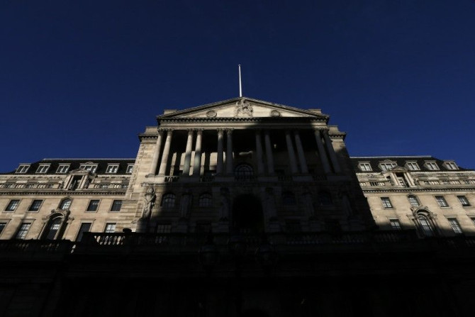 A shadow is cast on the Bank of England in London December 20, 2013. Standard