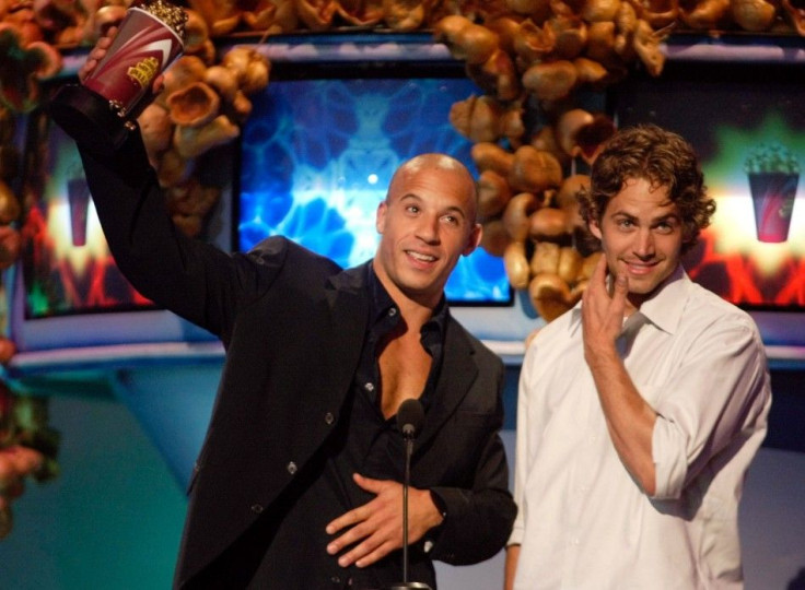 Actors Vin Diesel (L) and Paul Walker accept their award for Best On Screen Team for their roles in the film &quot;The Fast and the Furious&quot;