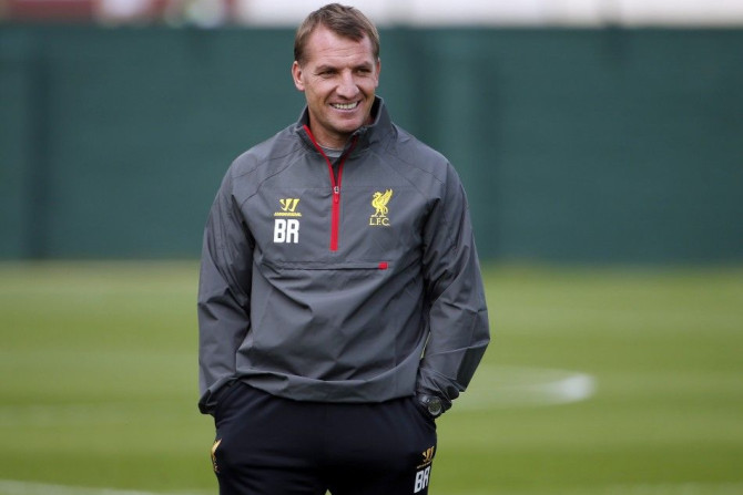 Liverpool's manager Brendan Rodgers smiles during a training session at the club's Melwood training complex in Liverpool, northern England September 15, 2014. Liverpool are set to play Bulgarian side Ludogorets Razgrad in the Champions League on